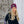 Load image into Gallery viewer, Woman wearing a black dress with floral sleeves and a purple beanie with embroidered bird design
